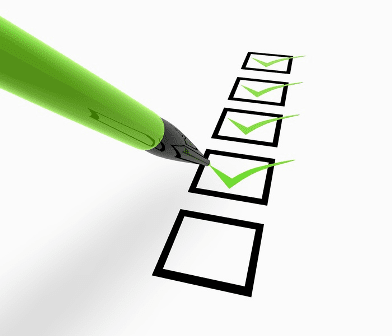 Image of a green pencil checking off checklist boxes in the blog 7 Moving Tips for First-time Renters.