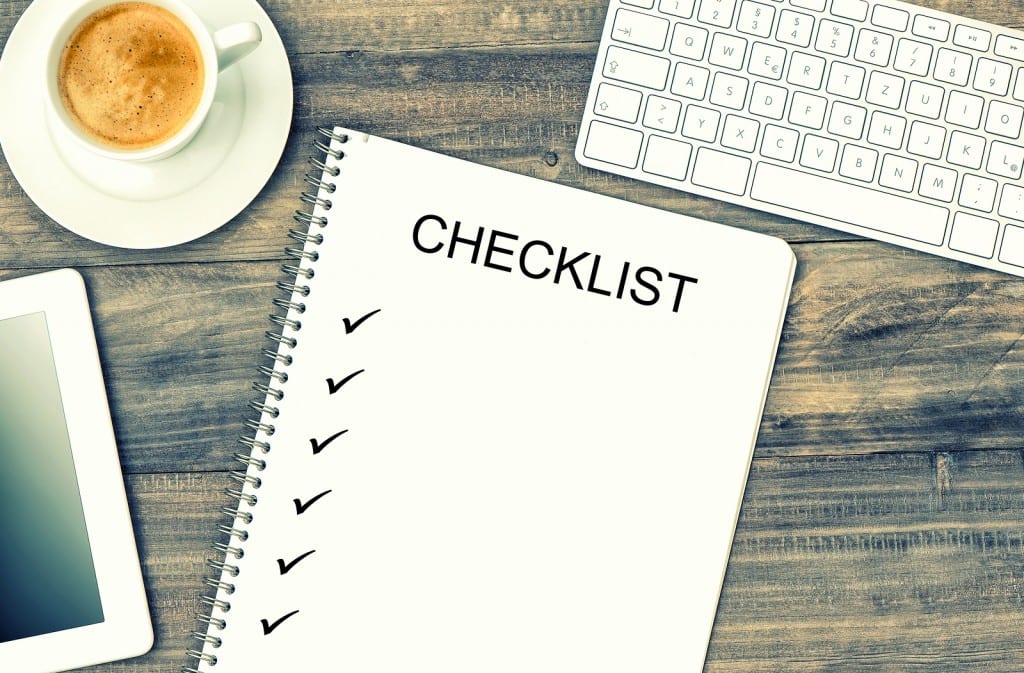 Image of a checklist on a desk, in the blog A Walkthrough Checklist for Renters.