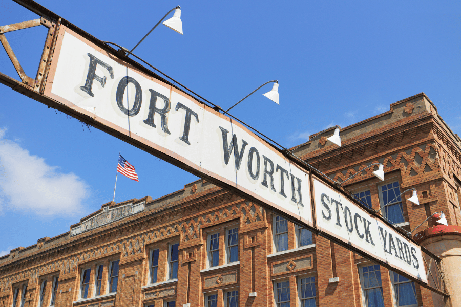 Property managers in Fort Worth brace for a tough 2024 market; image of Fort Worth Stockyards iconic sign.
